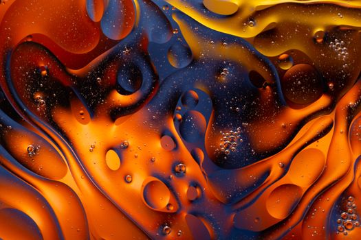 Close-up water and oil abstract in a rainbow lighting effect