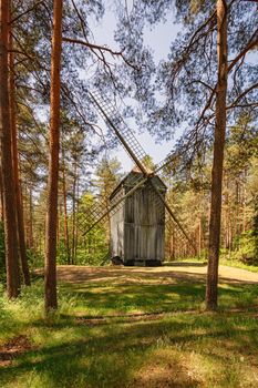 Old wooden windmill in rural area, Riga, Latvia