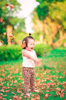 child girl standing in autumn