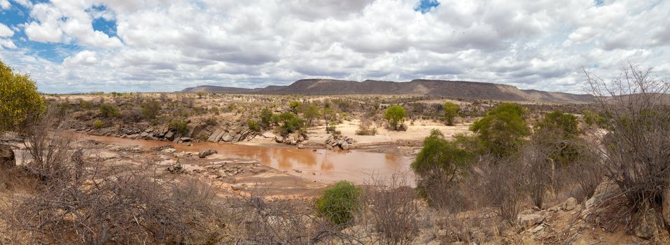 Landscape in Kenya with a river and mountains
