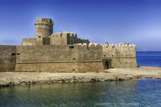 View of the scenic Aragonese Castle, aka Le Castella, on the Ionian Sea in the town of Isola di Capo Rizzuto, Italy