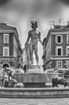The scenic Fontaine du Soleil with the statue of Apollo in Place Massena, major landmark in Nice, Cote d'Azur, France
