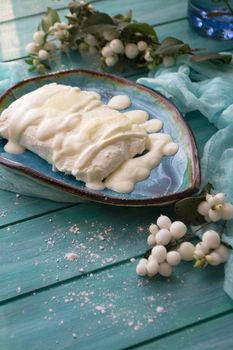 Bowl of fresh cottage cheese and sour cream, vertical image