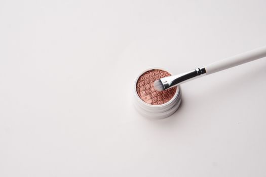 professional eyeshadow on isolated background and makeup brushes cosmetics fashion. High quality photo