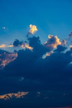 Heavy cloudy sky at sunset. A landscape of beautiful nature.