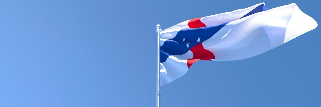 3D rendering of the national flag of Netherlands Antilles waving in the wind against a blue sky