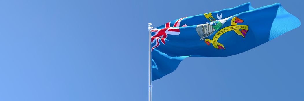 3D rendering of the national flag of South Georgia and the South Sandwich Islands waving in the wind against a blue sky