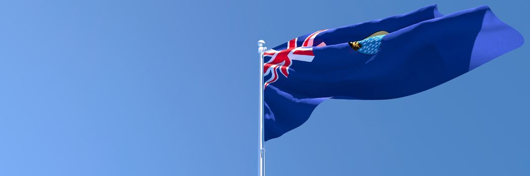 3D rendering of the national flag of Saint Helena waving in the wind against a blue sky