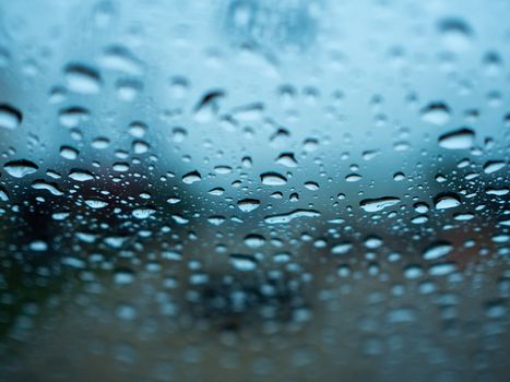 Rain drops on the glass during the heavy rains in the rainy season.