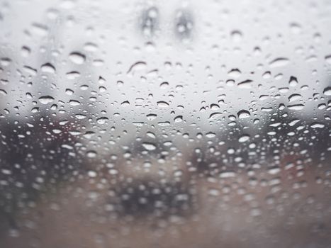 Rain drops on the glass during the heavy rains in the rainy season.