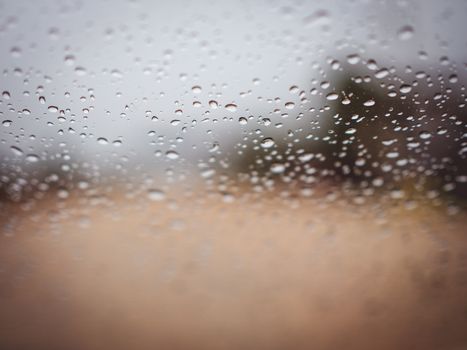 Rain drops on the glass during the heavy rains in the rainy season.