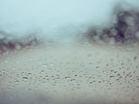 Rain drops on the glass during the heavy rains in the rainy season.