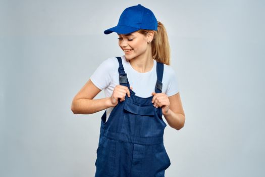 Woman in working uniform blue cap service lifestyle service. High quality photo