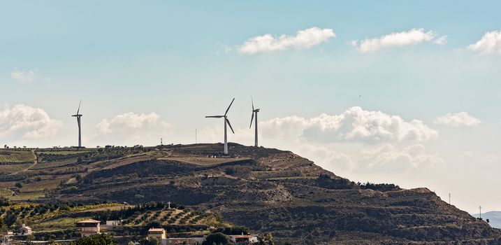 Electric wind turbines that produce electricity
