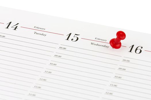 On a white background is the diary sheet date February 15 - Valentine's Day and is marked with a red needle clerical.