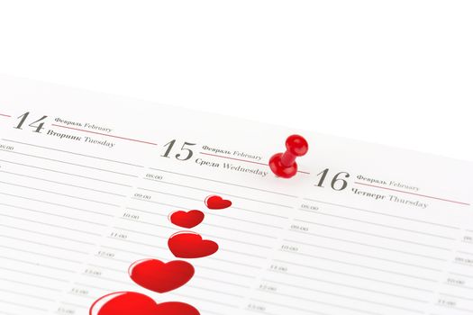 On a white background is the diary sheet date February 15 - Valentine's Day, and marked with a red needle paperwork and red hearts.