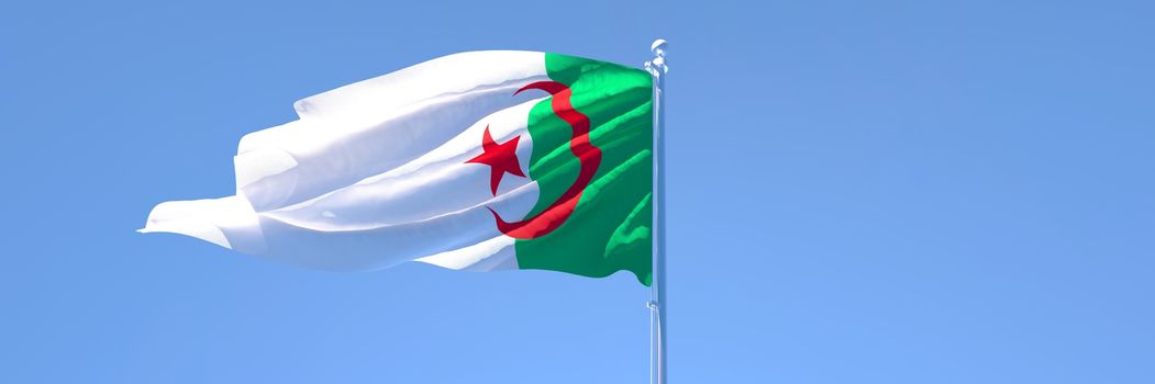 3D rendering of the national flag of Algeria waving in the wind against a blue sky