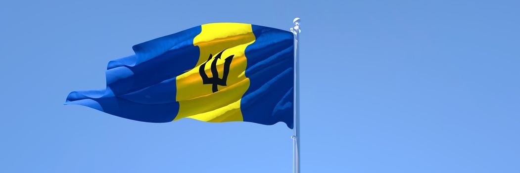 3D rendering of the national flag of Barbados waving in the wind against a blue sky