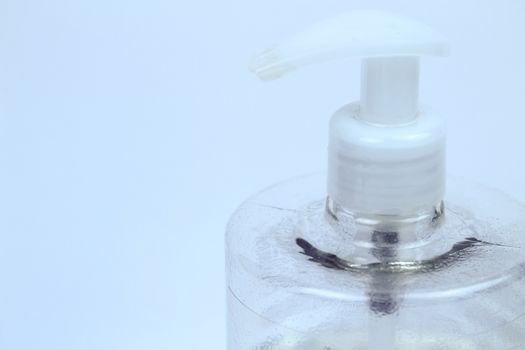 Hydroalcoholic gel bottle on white background in a hospital
