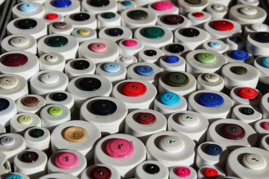 Colorful bottons for sale at a market stall in Santa Pola, Spain