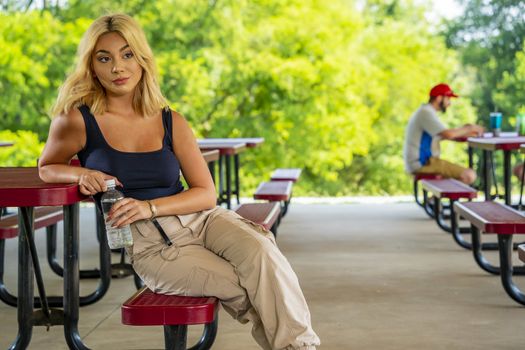 A gorgeous young blonde model enjoys a day outdoors while maintaining a safe distance from others during the Covid-19 pandemic