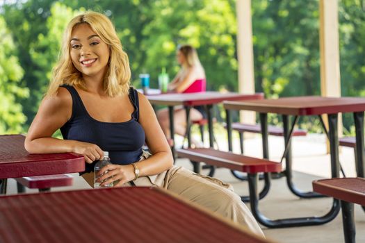 A gorgeous young blonde model enjoys a day outdoors while maintaining a safe distance from others during the Covid-19 pandemic