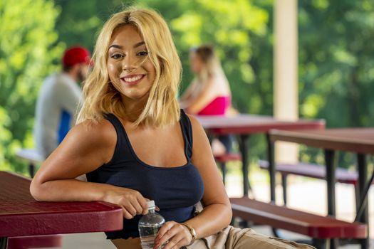 A gorgeous young blonde model enjoys a day outdoors while maintaining a safe distance from others during the Covid-19 pandemic