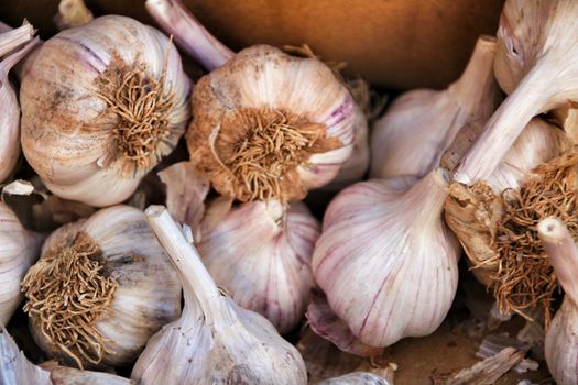 Garlic for sale at a market stall background