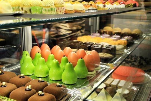 Colorful cakes and sweets in a pastry shop in Spain
