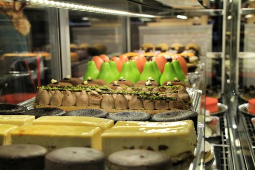 Colorful cakes and sweets in a pastry shop in Spain