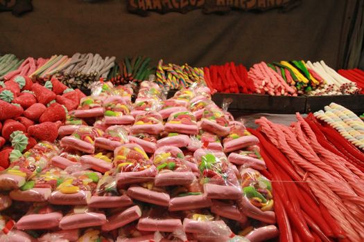 Tasty candies of various colors and flavors in a street stall in Elche