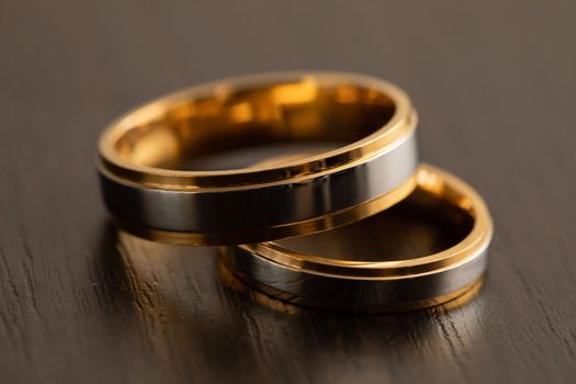 Gold wedding rings designed for newlyweds during the ceremonial marriage ceremony.