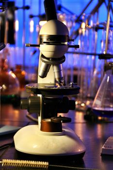 Glass test tubes,pots and microscope in a laboratory in Spain