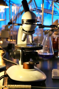 Glass test tubes,pots and microscope in a laboratory in Spain