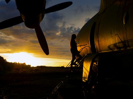 old Soviet military airplane, sunset time. Abandoned Historic Aircraft. Close up of propeller engine. Copy space