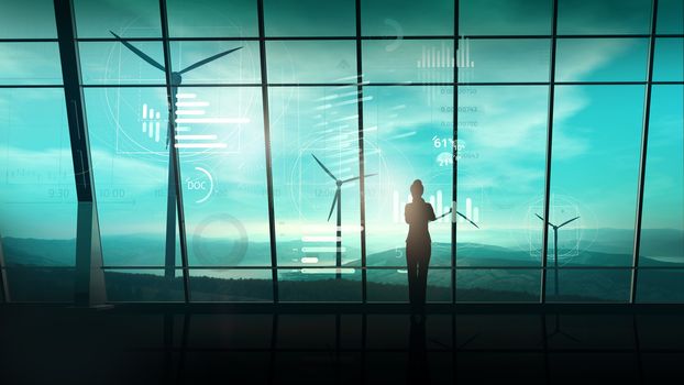 A female silhouette in a business suit is standing in the office with large windows overlooking the wind farms, and in front of it is a virtual infographic.