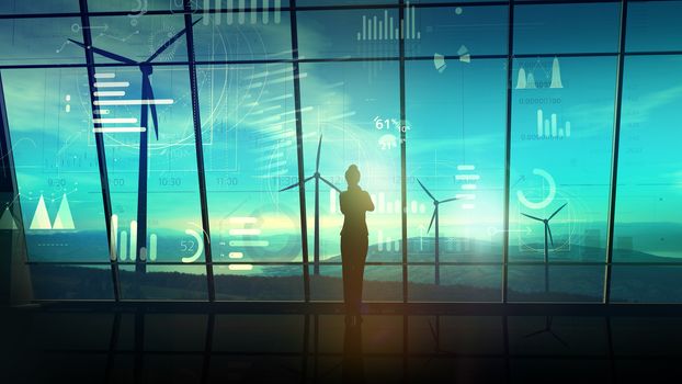 Silhouette of a business woman is standing in the office with large windows overlooking the wind power stations, and in front of it is a virtual infographic.