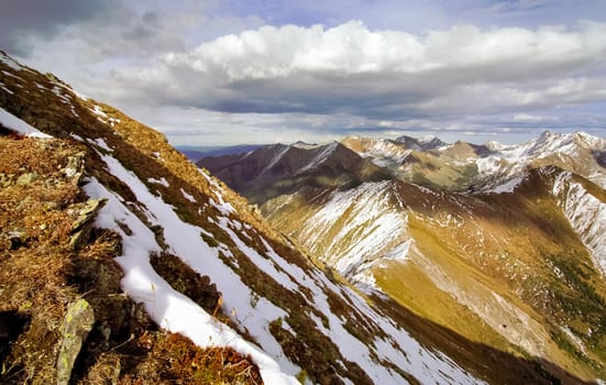 Mount Sayan in winter in the snow. The nature of the mountains is sayan.