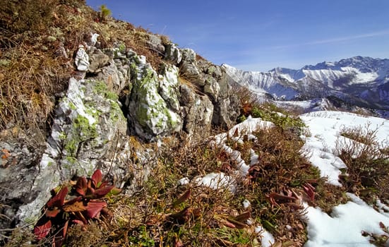 Mount Sayan in winter in the snow. The nature of the mountains is sayan.