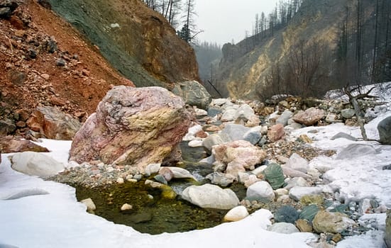 Mount Sayan in winter in the snow. The nature of the mountains is sayan.