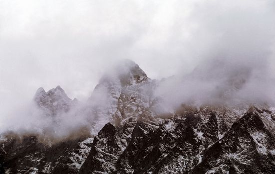 Mount Sayan in winter in the snow. The nature of the mountains is sayan.