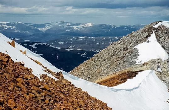 Mount Sayan in winter in the snow. The nature of the mountains is sayan.