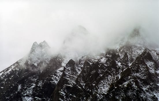 Mount Sayan in winter in the snow. The nature of the mountains is sayan.