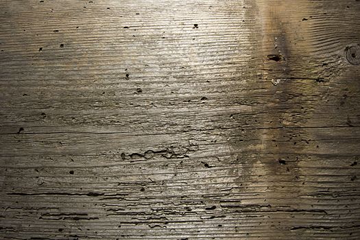 Old worn wooden board as a background