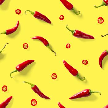 Red hot chilli seamless peppers pattern. Seamless pattern made of red chili or chilli on yellow background. Minimal food pattern. Food background.