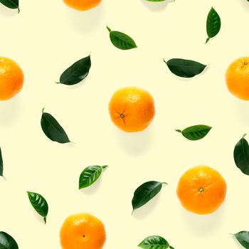 Mandarin seamless pattern, tangerine, clementine isolated on yellow background with green leaves. Collection of fine Mandarine seamless patterns.