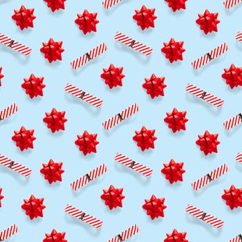 Seamless regular creative Christmas pattern with New Year decorations on blue background. xmas Modern Seamless pattern made from christmas decorations. Photo quality pattern for fabric, prints, wallpapers, banners or creative design works.