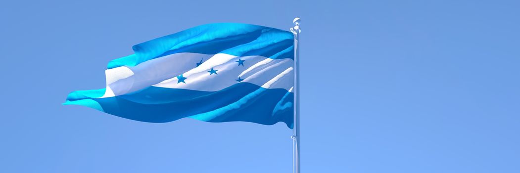 3D rendering of the national flag of Honduras waving in the wind against a blue sky