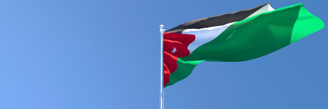 3D rendering of the national flag of Jordan waving in the wind against a blue sky