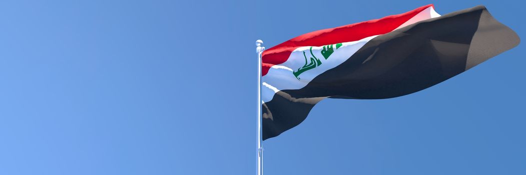 3D rendering of the national flag of Iraq waving in the wind against a blue sky